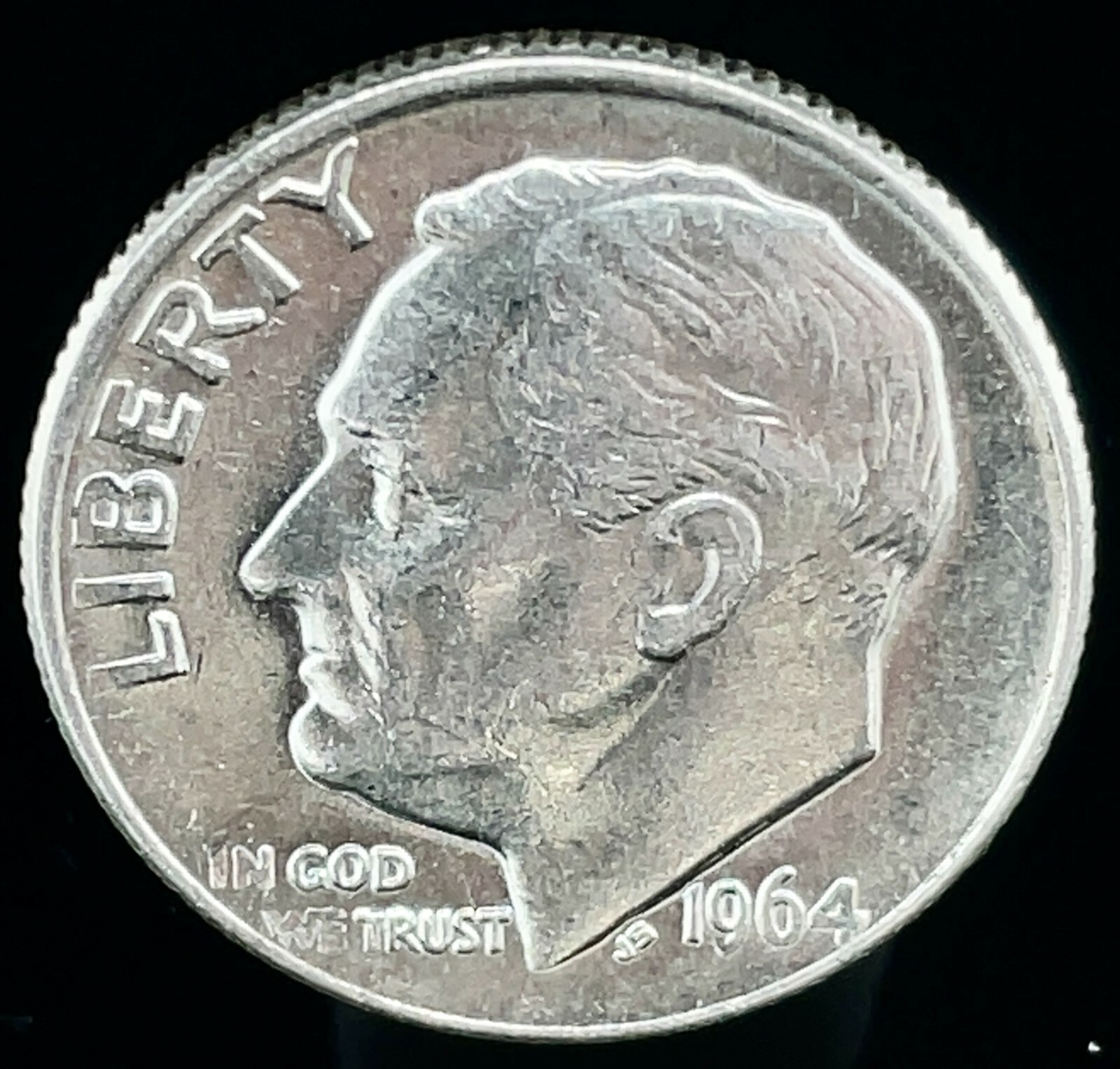1964-D RPM repunched mint mark error showing doubled D mint mark left of torch base